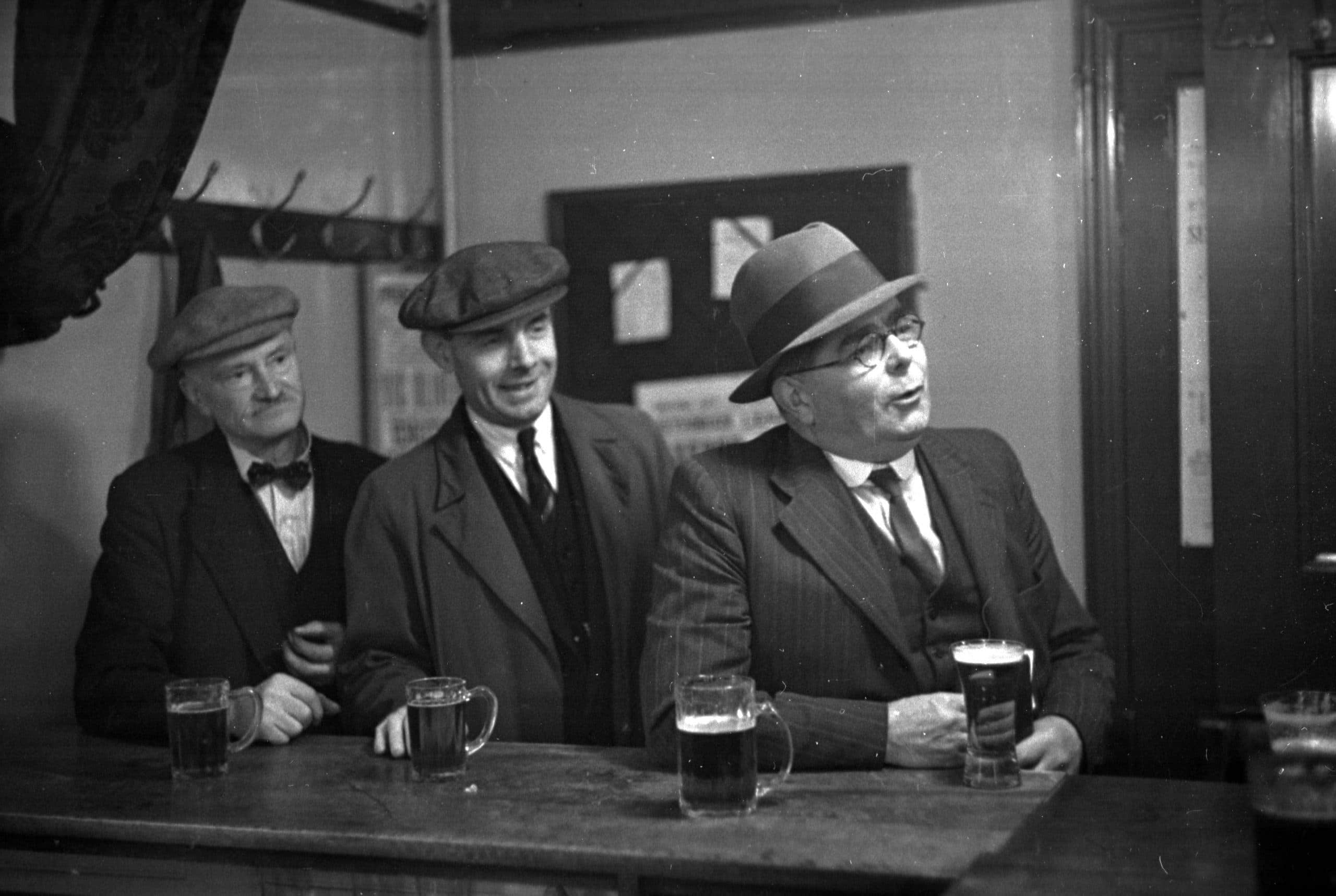 Three men in an Oxford pub.