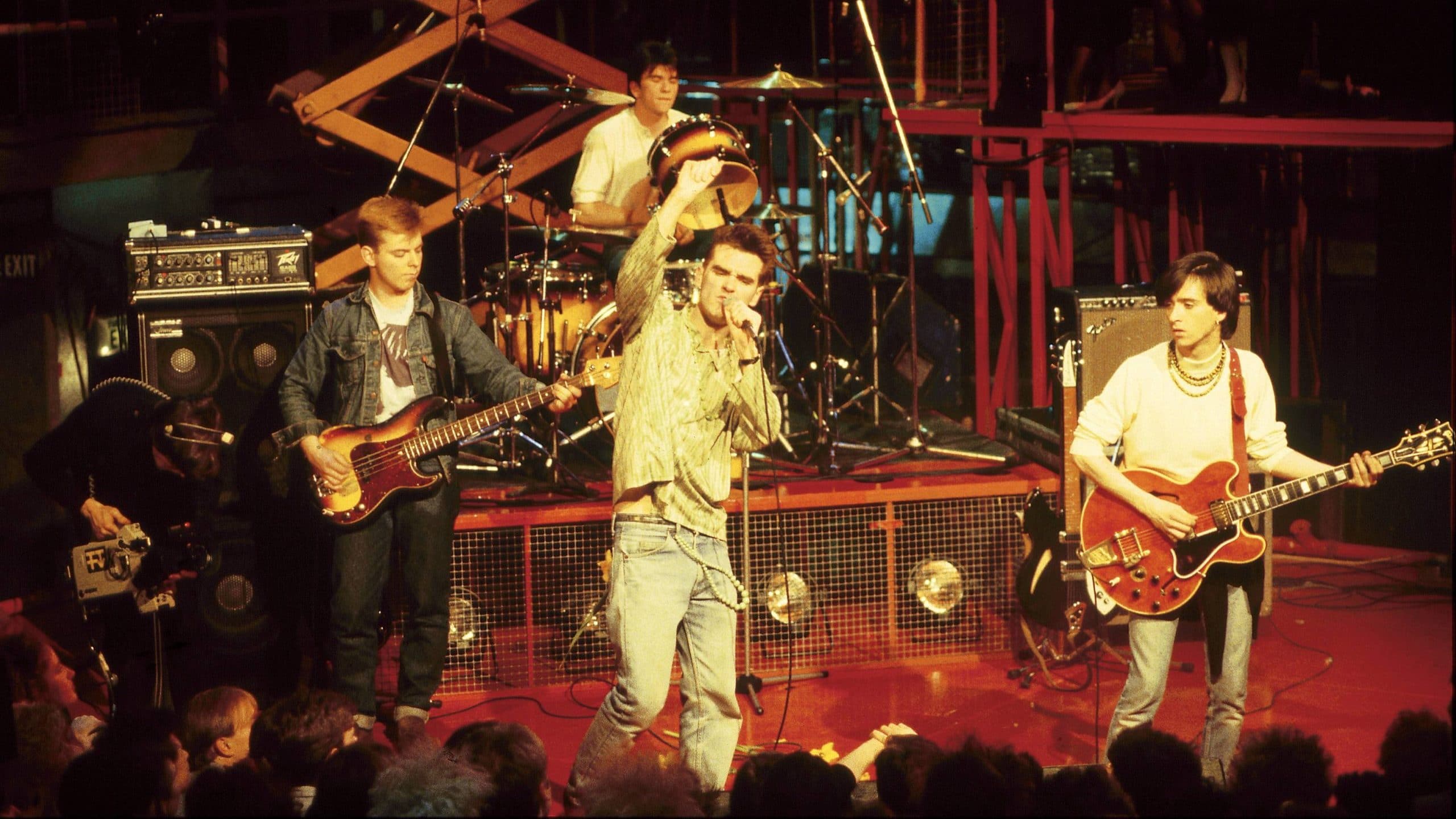 Morrissey and The Smiths performing