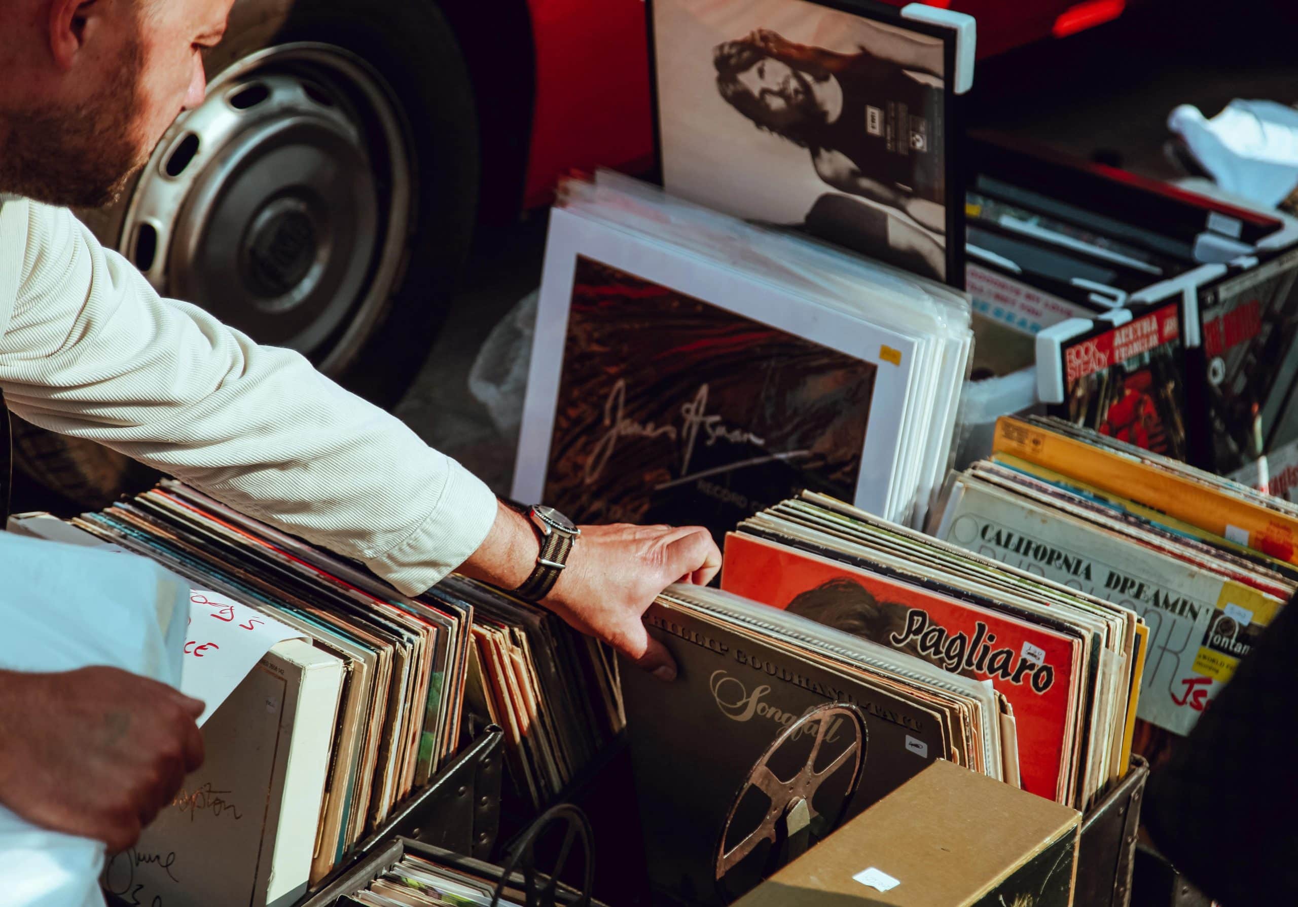 Man sorting through vinyl records