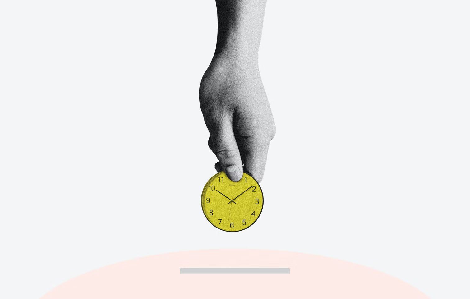 hand holding a yellow clockface