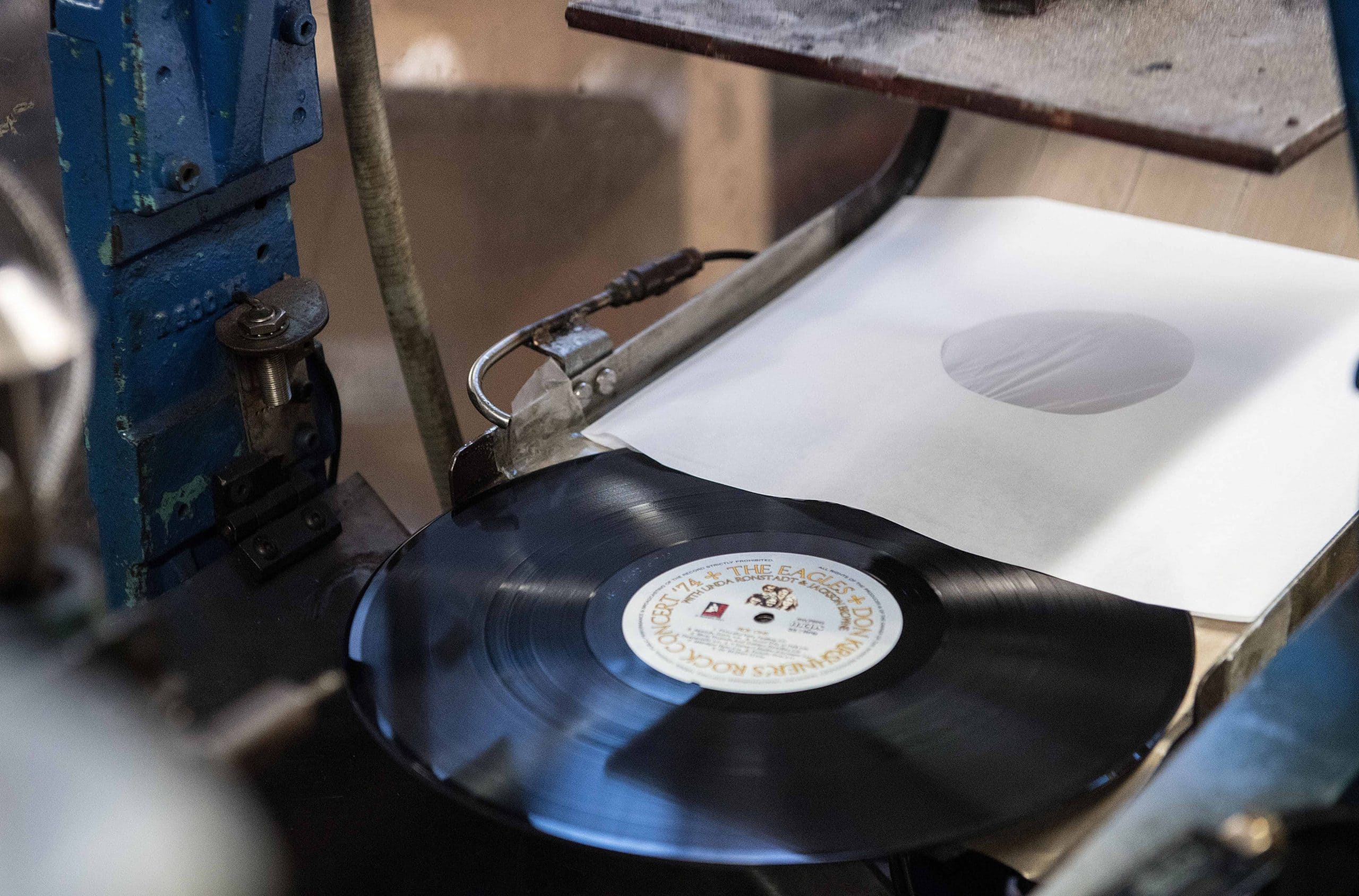 Vinyl being pressed