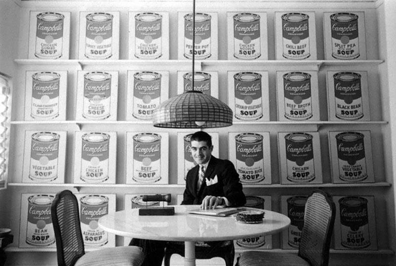 Irving Blum with Andy Warhol’s 32 Campbell's Soup Cans In 1962. © William Claxton, Courtesy Demont Photo Management, Llc