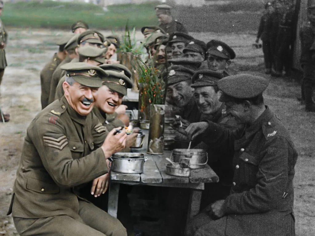 Restored colour photo of ww1 soldiers eating