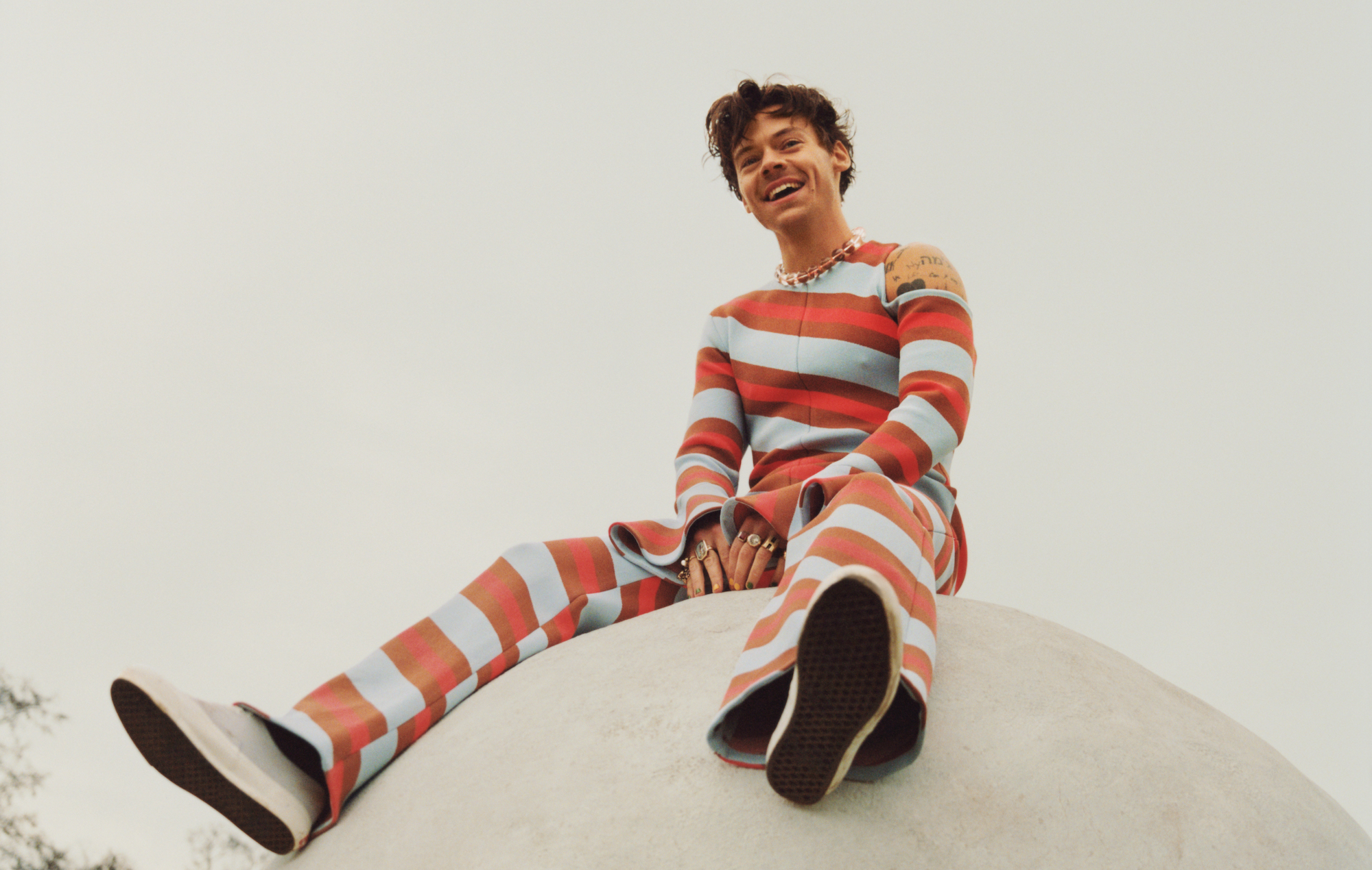 Harry Styles wearing red stripes