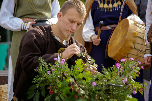 man tending to a small bunch of flowers