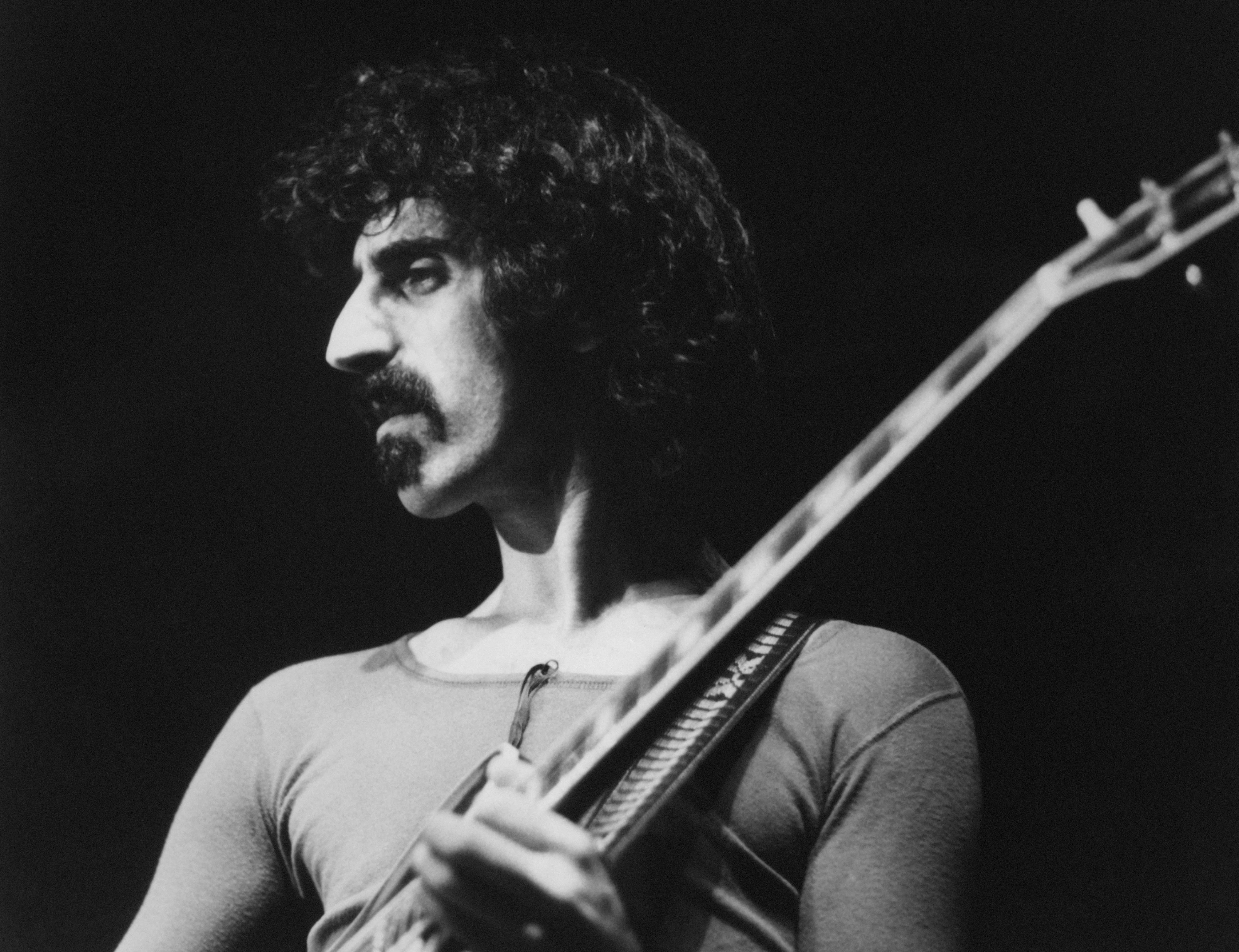 Frank Zappa playing guitar