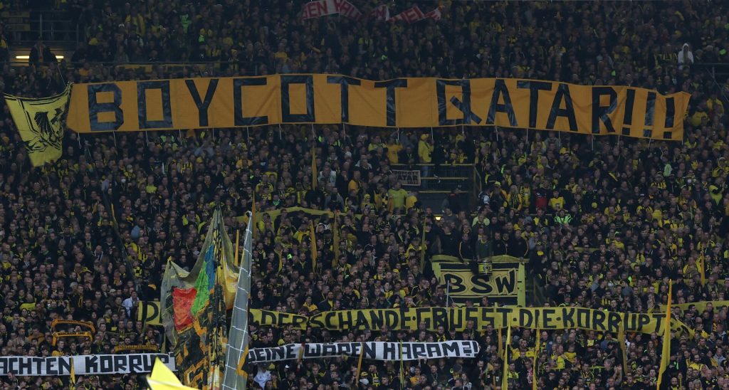 German football fans protesting before Qatar 2022