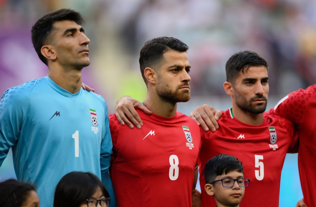 The Iran team standing in silence during their national anthem at Qatar 2022