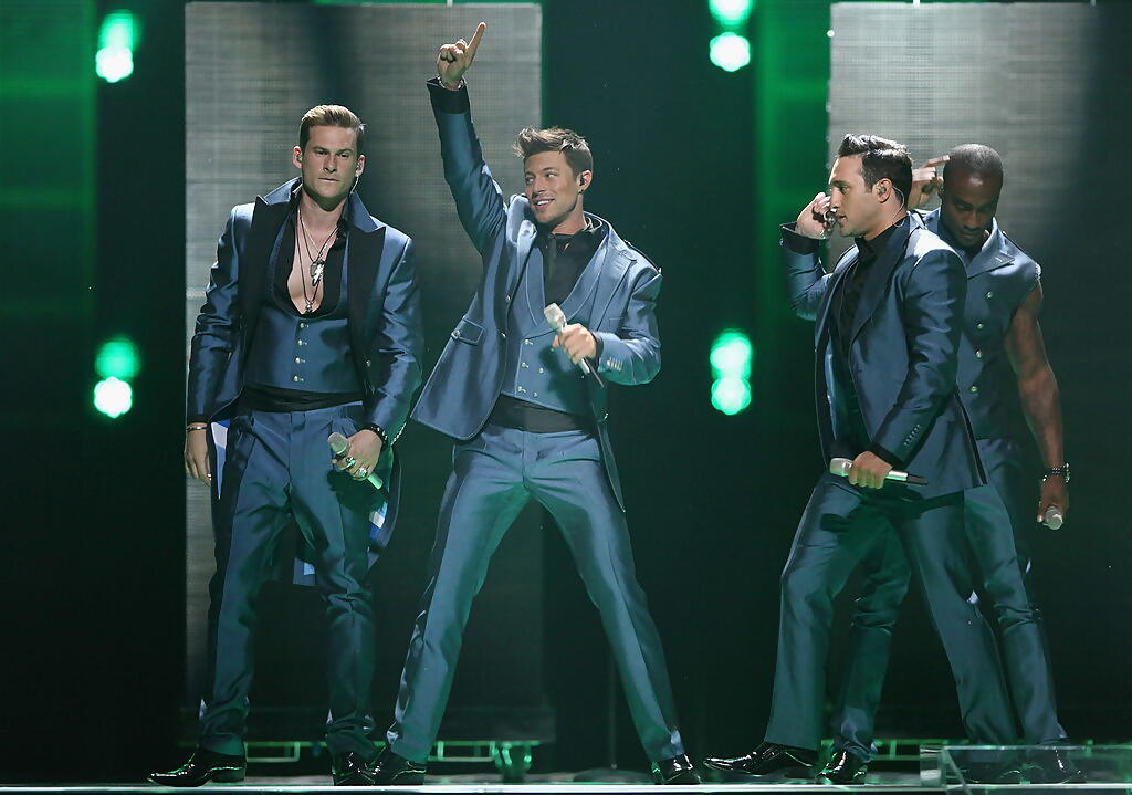 Lee Ryan (left) performing with Blue ahead of Eurovision in 2011