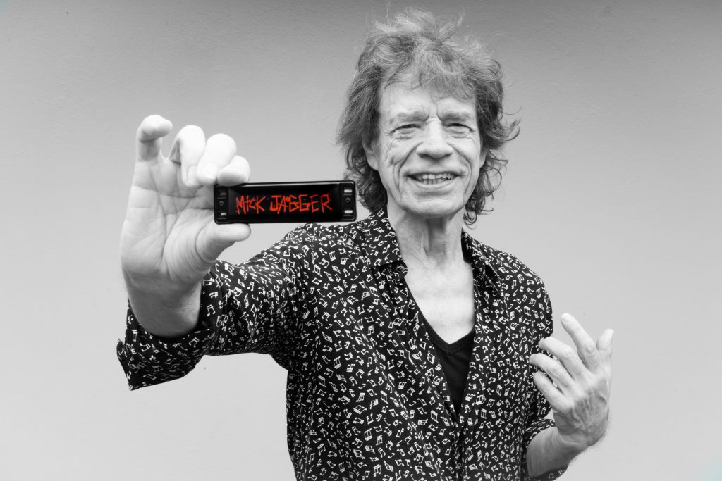 Mick Jagger with harmonica