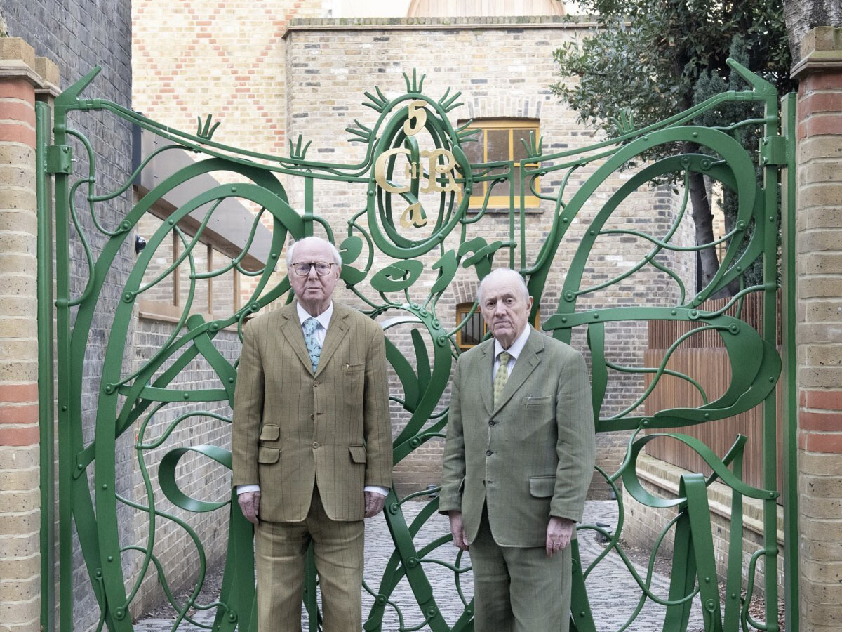 Gilbert & George outside the Gilbert & George Centre. Photo by Yu Yigang, courtesy Gilbert & George