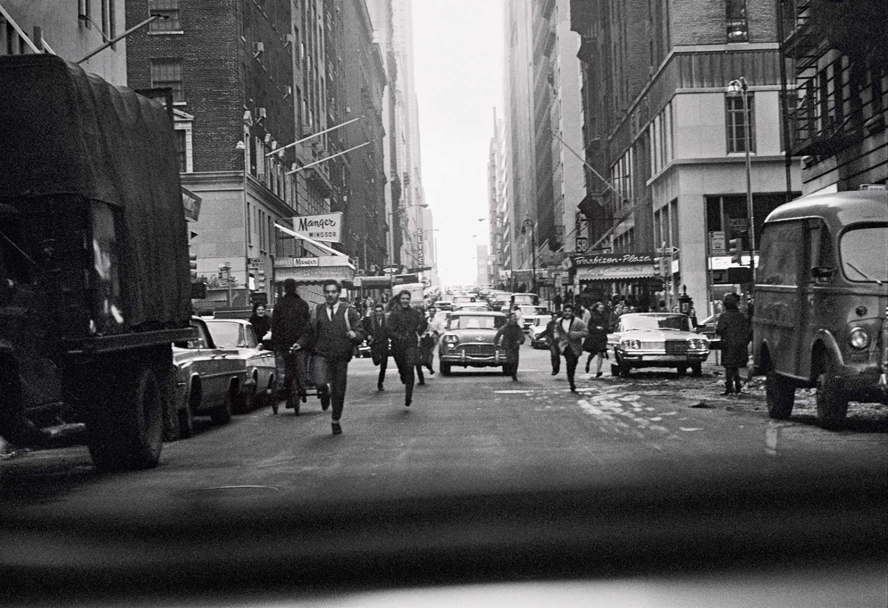 The crowds chasing us in A Hard Day's Night were based on moments like this, McCartney writes. Taken out of the back of our car on West Fifty-Eighth, crossing the Avenue of the Americas.