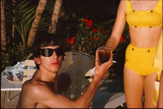 George Harrison looking young, handsome and relaxed. Living the life. Miami Beach, February 1964. © 1964 Paul McCartney.