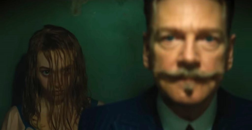Kenneth Branagh's Poirot stands in front of a creepy ghost girl in our a haunting in venice review