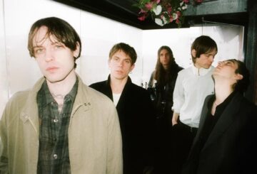 Iceage press photo 2026, featuring Elias Rønnenfelt, Johan Suurballe Wieth, Dan Kjær Nielsen, Casper Morilla Fernandez and Jakob Tvilling Pless